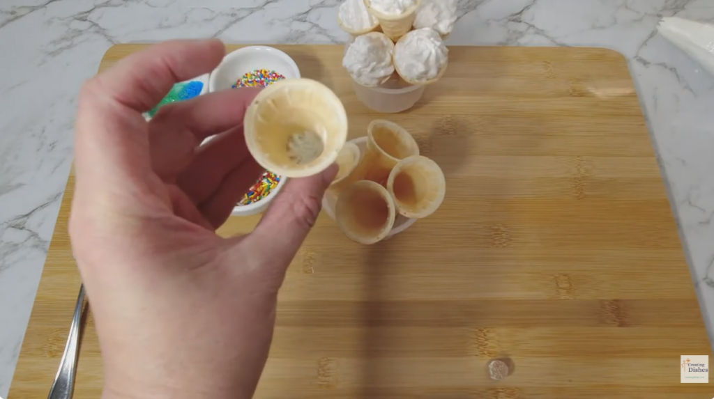 Pop the sherbet into the bottom of each cone
