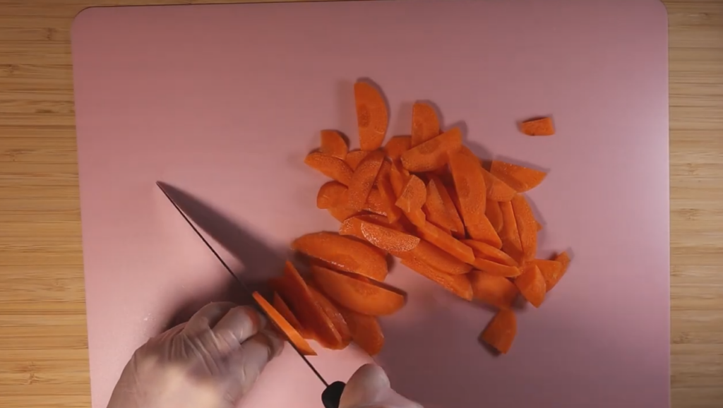 Slicing carrots for the Hokkien Noodle stir fry.