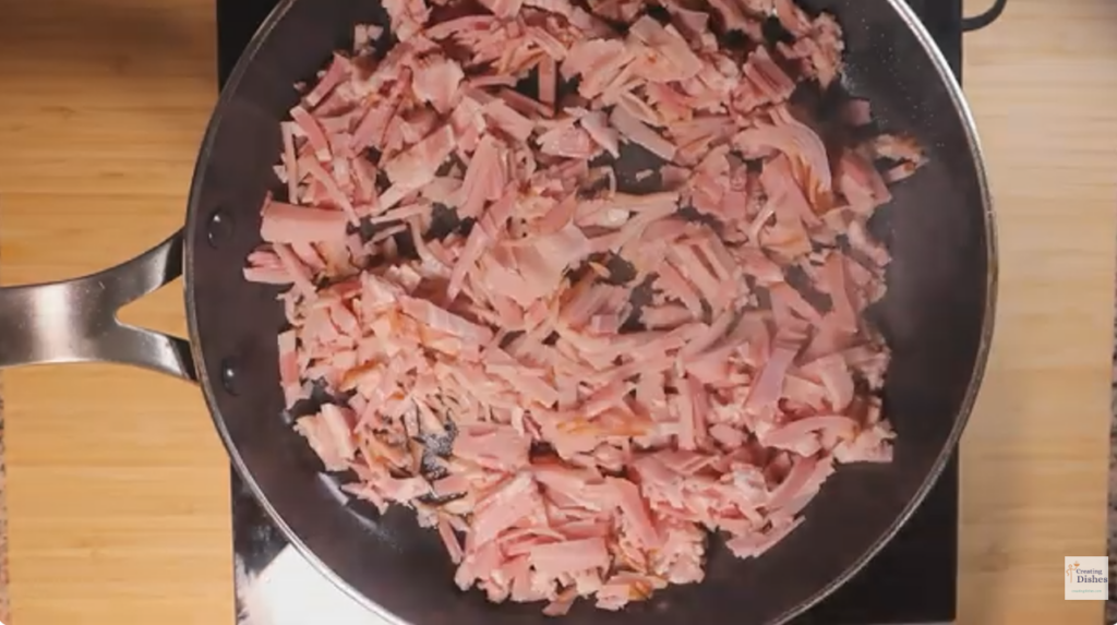 Cooking Bacon in a frying pan for Hookien Noodles