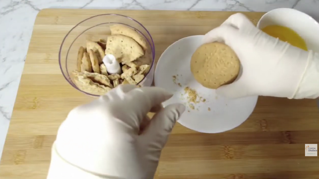 
Biscuits in a mini blender to crush into crumbs.