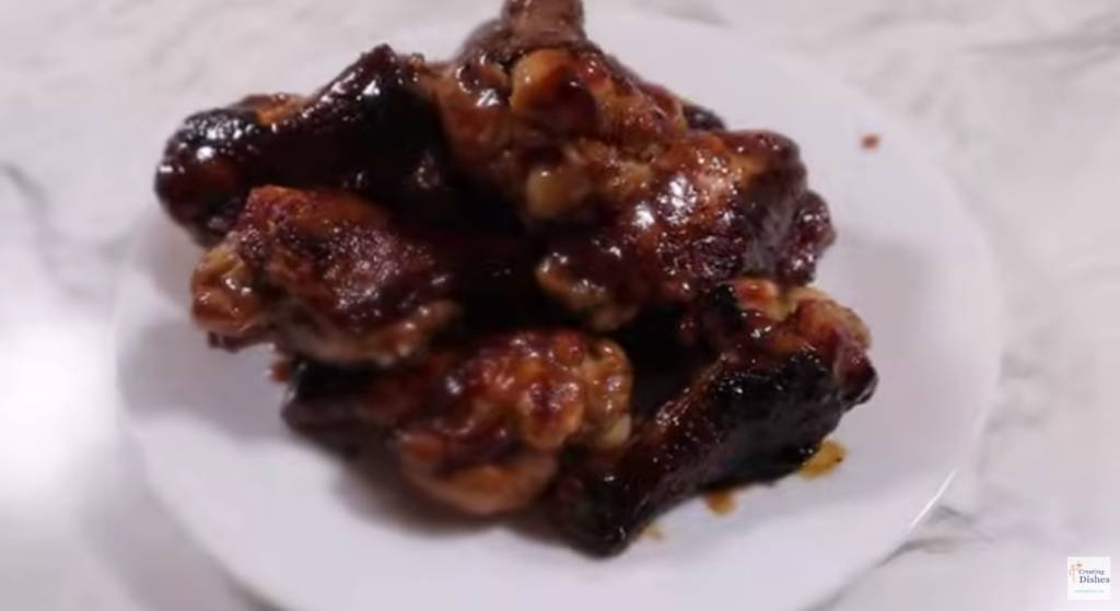 Coca Cola chicken wings on a plate